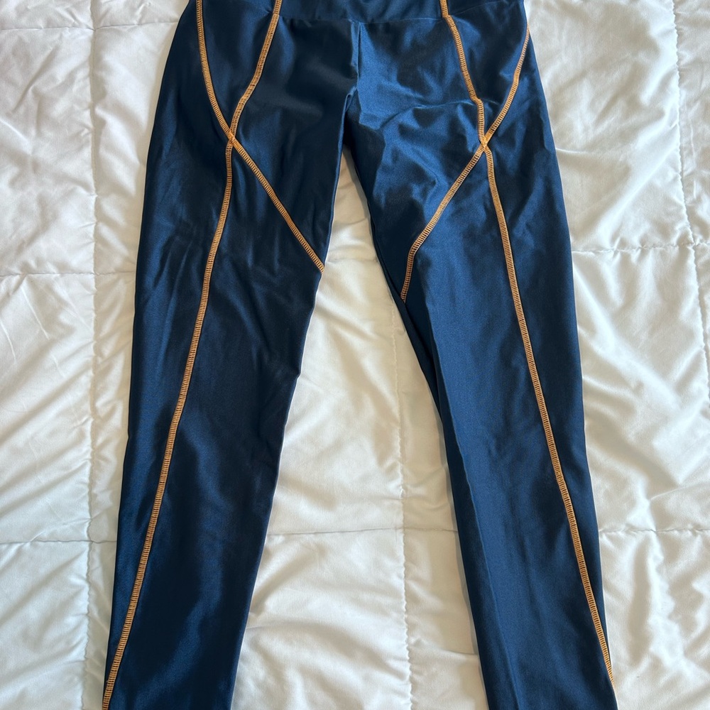Blue Leggings with orange Accents